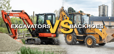 Kubota excavator compared to a CAT backhoe parked at a job site