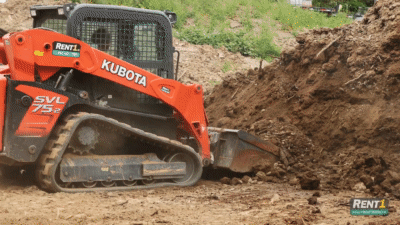 Kubota CTL being used to dig