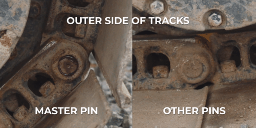 Close-up of the outer side of steel tracks showing the master pin compared to a regular pin
