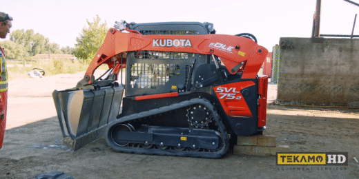 Using the bucket on a compact track loader to lift the Kubota SVL 75-2